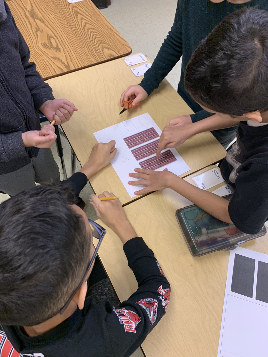 miss_grade's tweet photo. Learning about division as fractions with the help of some chocolatey deliciousness! #gomustangs #oakridge https://t.co/sLqwaShQ8A