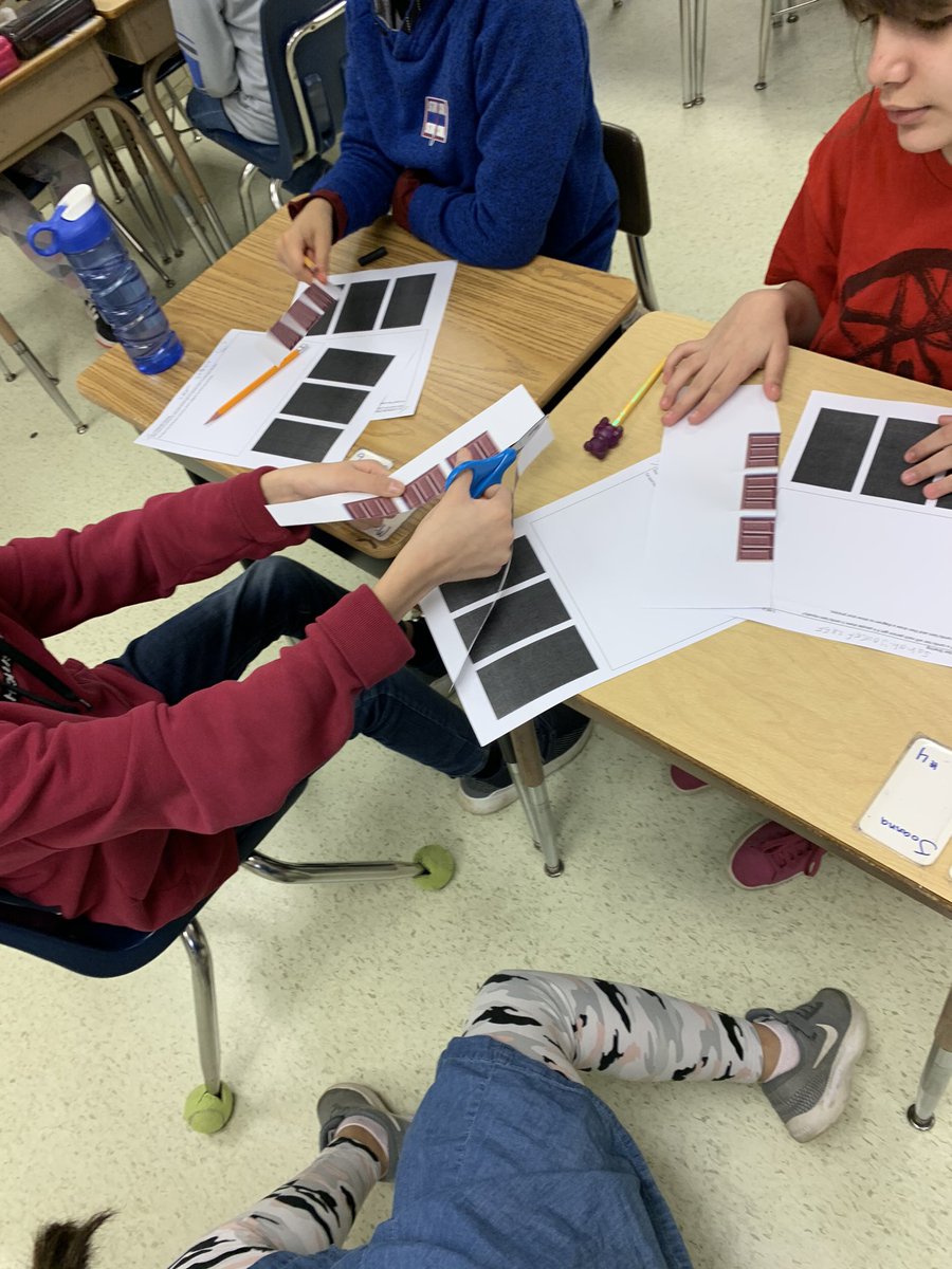 miss_grade's tweet photo. Learning about division as fractions with the help of some chocolatey deliciousness! #gomustangs #oakridge https://t.co/sLqwaShQ8A