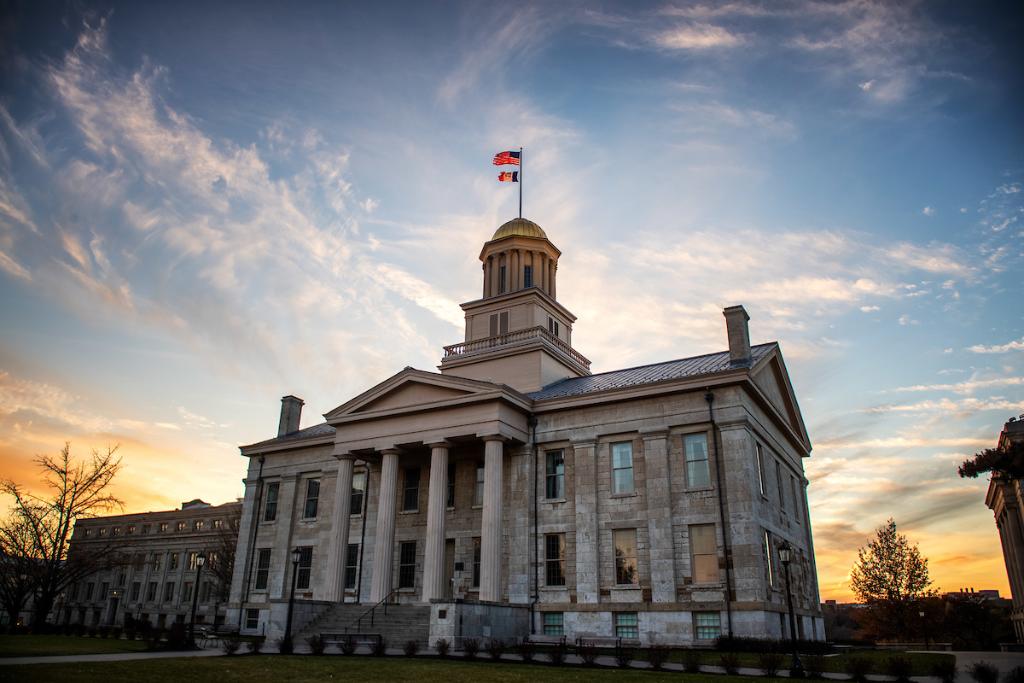 A blue and orange sky at golden house light the Old Capitol building.