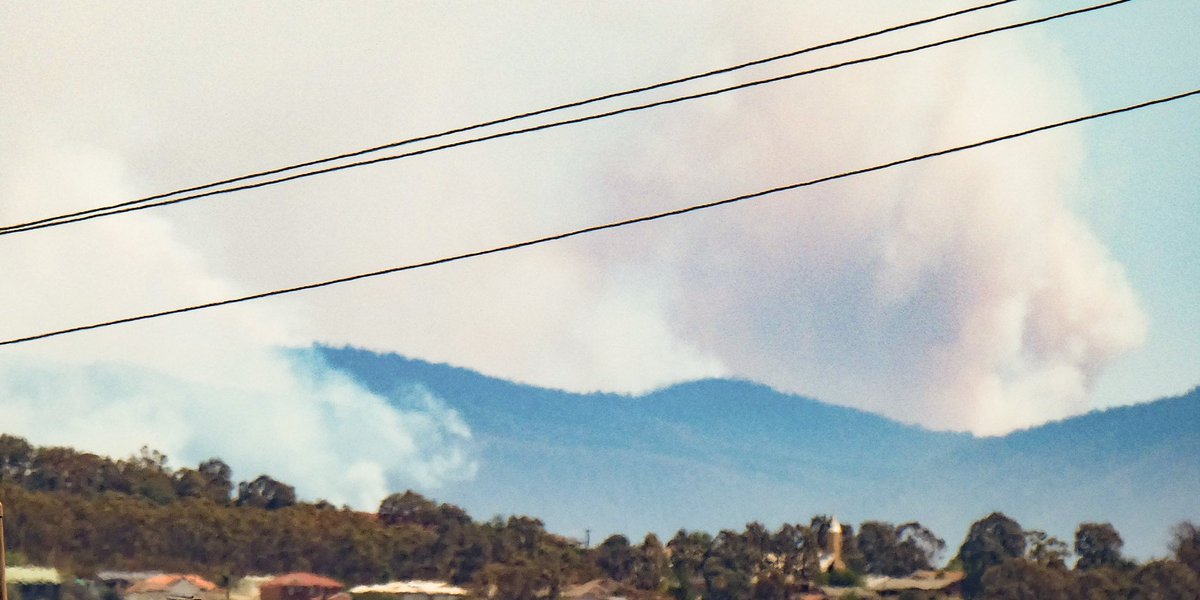 Action__Dave's tweet photo. Queanbeyan, NSW with the #orroralfire in the background.

@hamishNews and the @QandA panel will be able to see the glow as they go to air tonight. #qanda #AustraliaOnFire #AustraliaBurning #canberrafire https://t.co/nJz0Sa6xbF