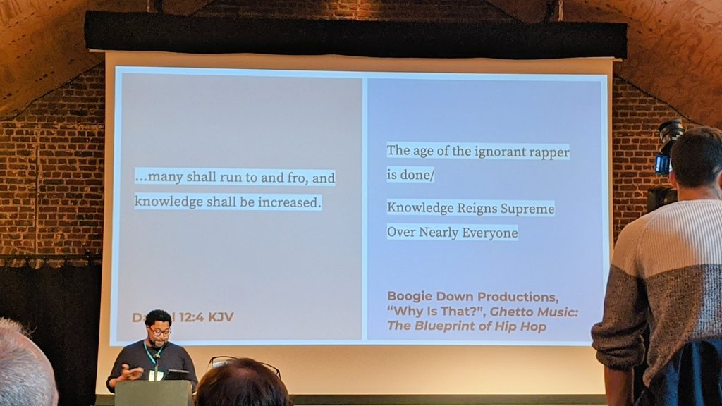 Slides at Copyleftconf, Daniel 12:4 on the left, and "Why is That"? Boogie Down Productions