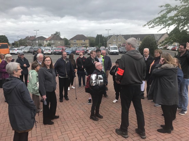 The group takes a minute at Kirkintilloch leisure centre, to wait on the rest of the walkers catching up.