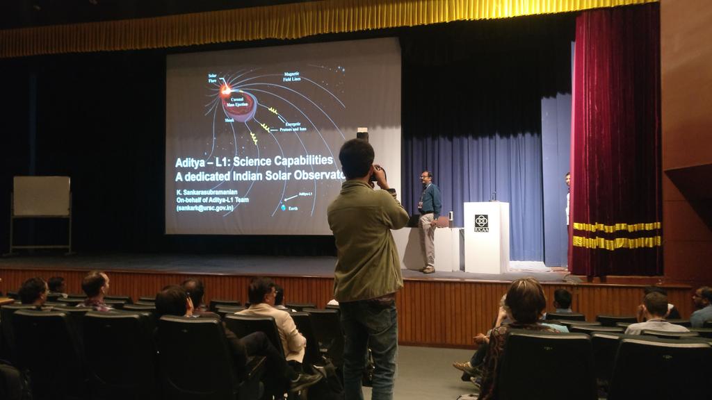 ydnad0's tweet photo. K. Sankarasubramanian talks of the science goals of @isro #AdityaL1 space mission which will observe the Sun and assess #spaceweather from #LagrangepointL1 #APSPM2020 #APSPM https://t.co/8iNQJ3y6XS