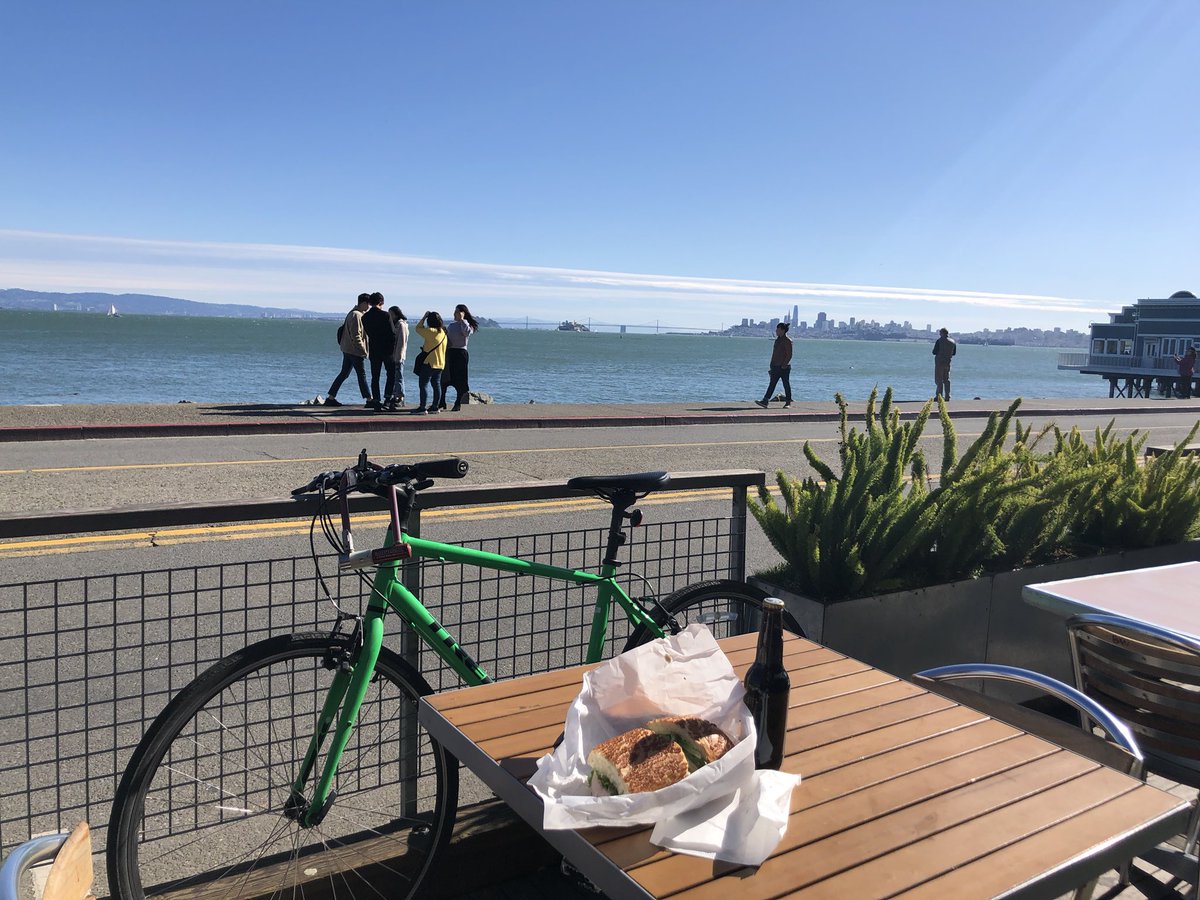 My sandwich and bike in front of the view of SF in Sausalito