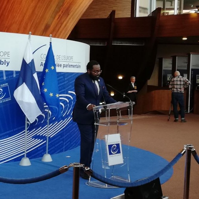 Malcom M. Jallow at the opening of the exhibition Equality Betrayed - Impacts of discriminatory stop and search. 