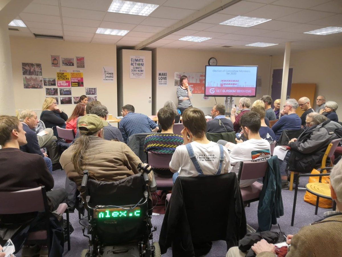Image of Ellie Harrison from Get Glasgow Moving at their AGM, holding an election for committee members.