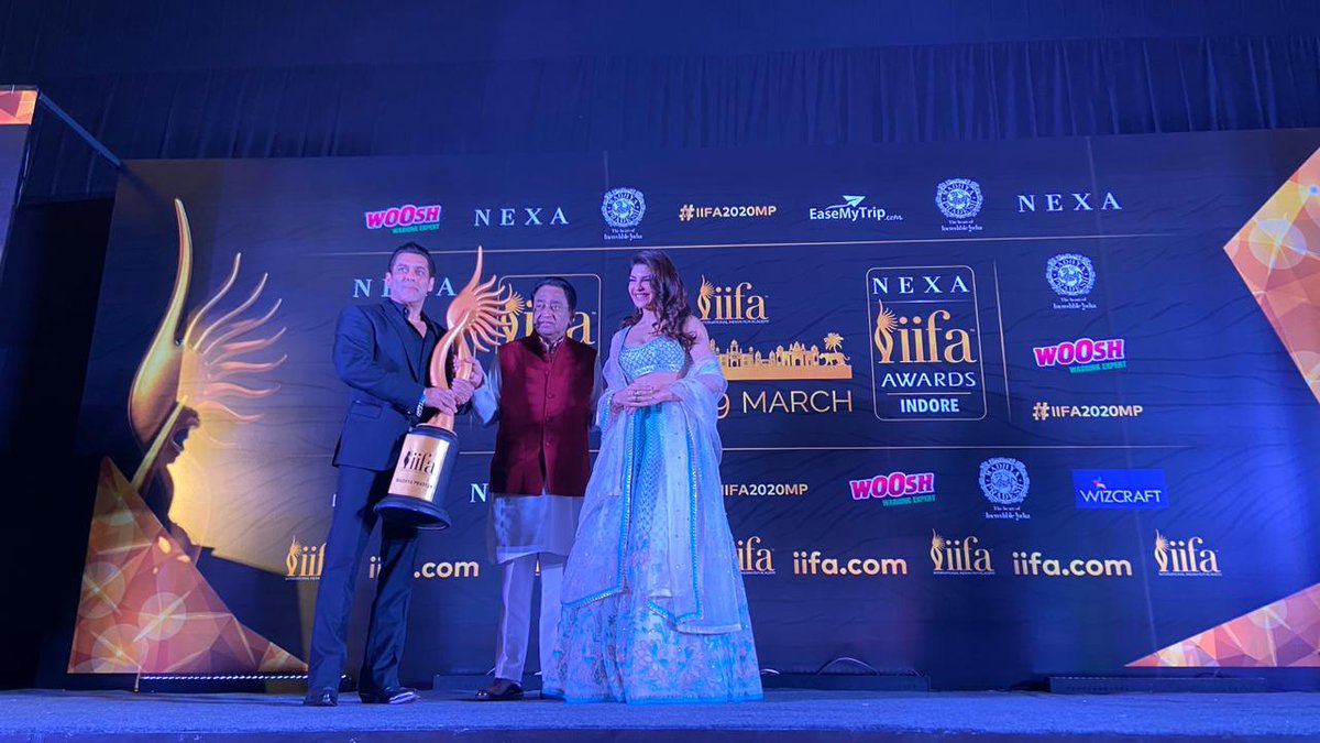 IIFA's tweet photo. . @BeingSalmanKhan and @Asli_Jacqueline present the IIFA trophy to the Hon. Chief Minister @OfficeOfKNath ji. 
#IIFA2020MP #IIFA https://t.co/AptW4dBcVr