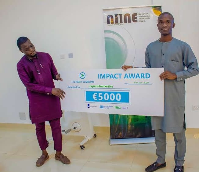 Infonineorg's tweet photo. Winning Moments from the TNE IMPACT AWARDS 2020. Our communications executive, Faiz Aliyu presenting the €5000 prize to @Experisimmerse Winner of the Impact Awards and the winners of best startup in the Fashion, Agriculture, Renewable energy sectors and Most versatile startup. https://t.co/Enl7B19TFG