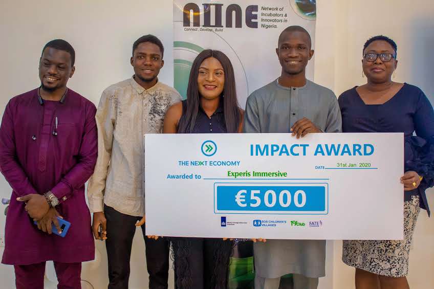Infonineorg's tweet photo. Winning Moments from the TNE IMPACT AWARDS 2020. Our communications executive, Faiz Aliyu presenting the €5000 prize to @Experisimmerse Winner of the Impact Awards and the winners of best startup in the Fashion, Agriculture, Renewable energy sectors and Most versatile startup. https://t.co/Enl7B19TFG
