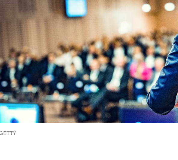photo of audience listening to keynote speaker. credit: Getty. Article by customer service keynote speaker Micah Solomon