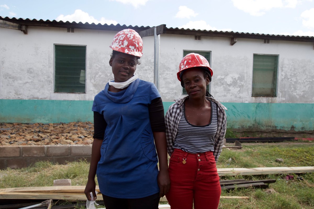 Women in Mozambique wearing construction gear