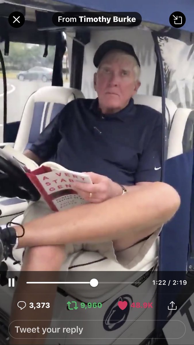 Occupy_FL_HOA's tweet photo. @joncoopertweets Gotta LOVE this guy readN, “A Very Stable Genius”, while accosted by some crazy woman “on theOutside”😉 insisting he’s somehow theAggressive one sitting N his golf cart reading his book UNWILLING2 #AcquitTheGuilty #TrumpCompulsiveLiar #TrumpIsASexualPredator #TrumpBigotAndRacist https://t.co/6EzFn3FtOV