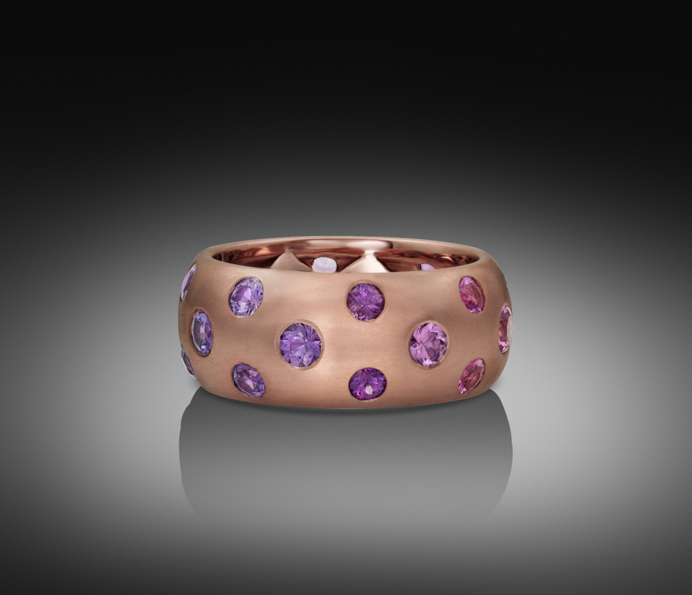 AJDC_online's tweet photo. Announcing the AJDC 2019 Design Project #PolkaDot!

Mark Patterson - Polka Dot
“The ring is made in two components, an inner lining with a band. The band has different sizes of sapphires transitioning from pink to purple.”
Photograph: SaraRey https://t.co/QcaclgKE5K