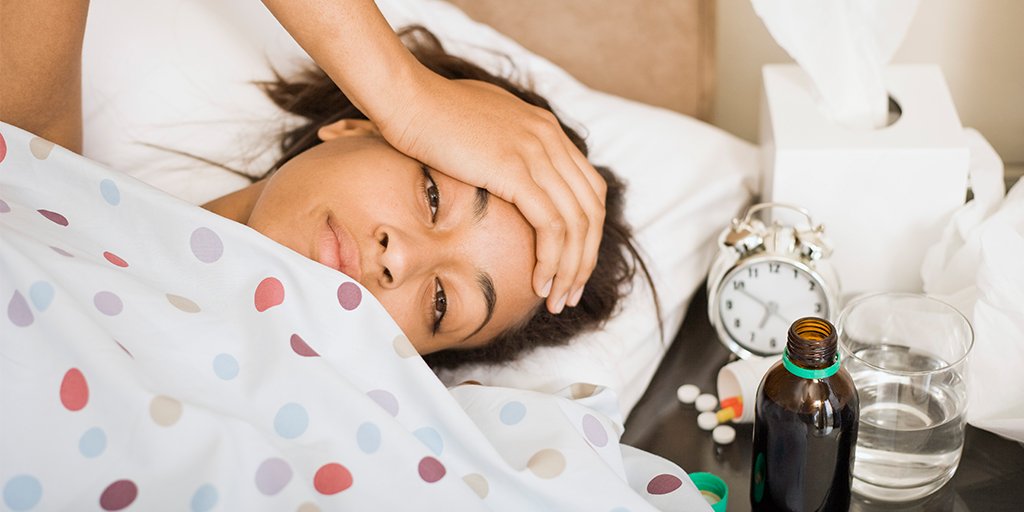 Person resting in bed.