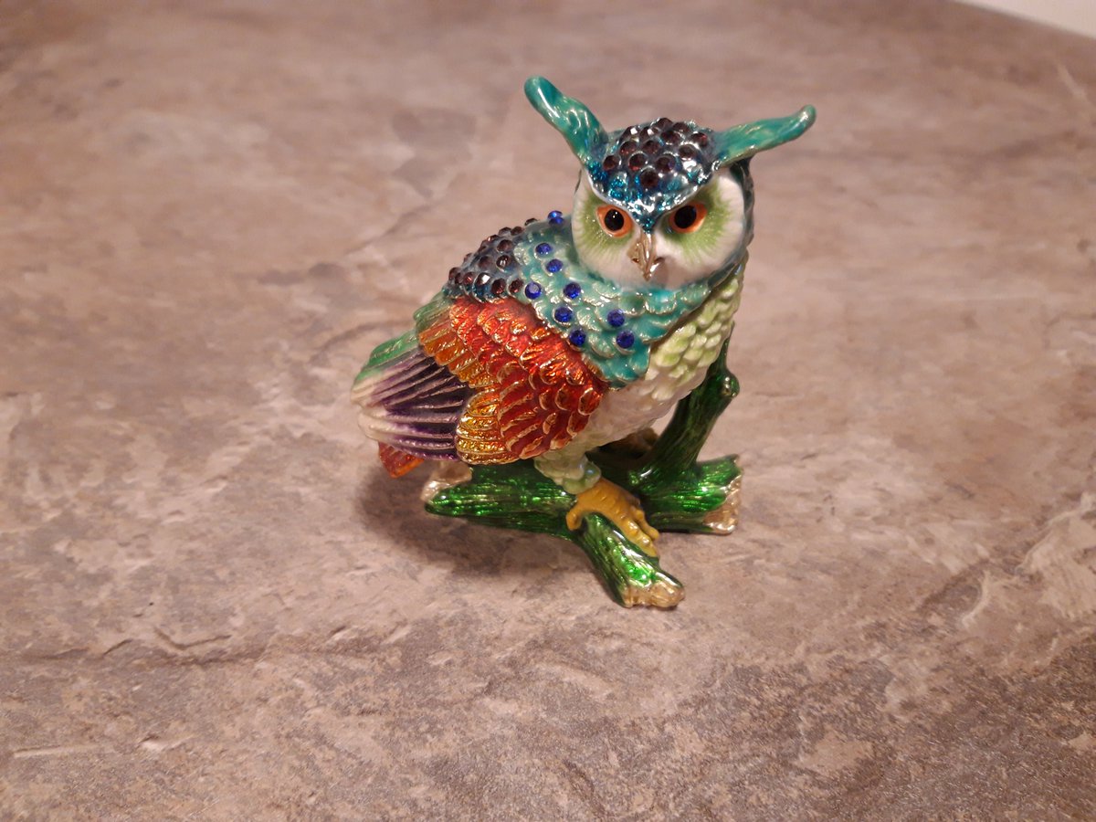 Bejeweled colourful enameled metal owl.