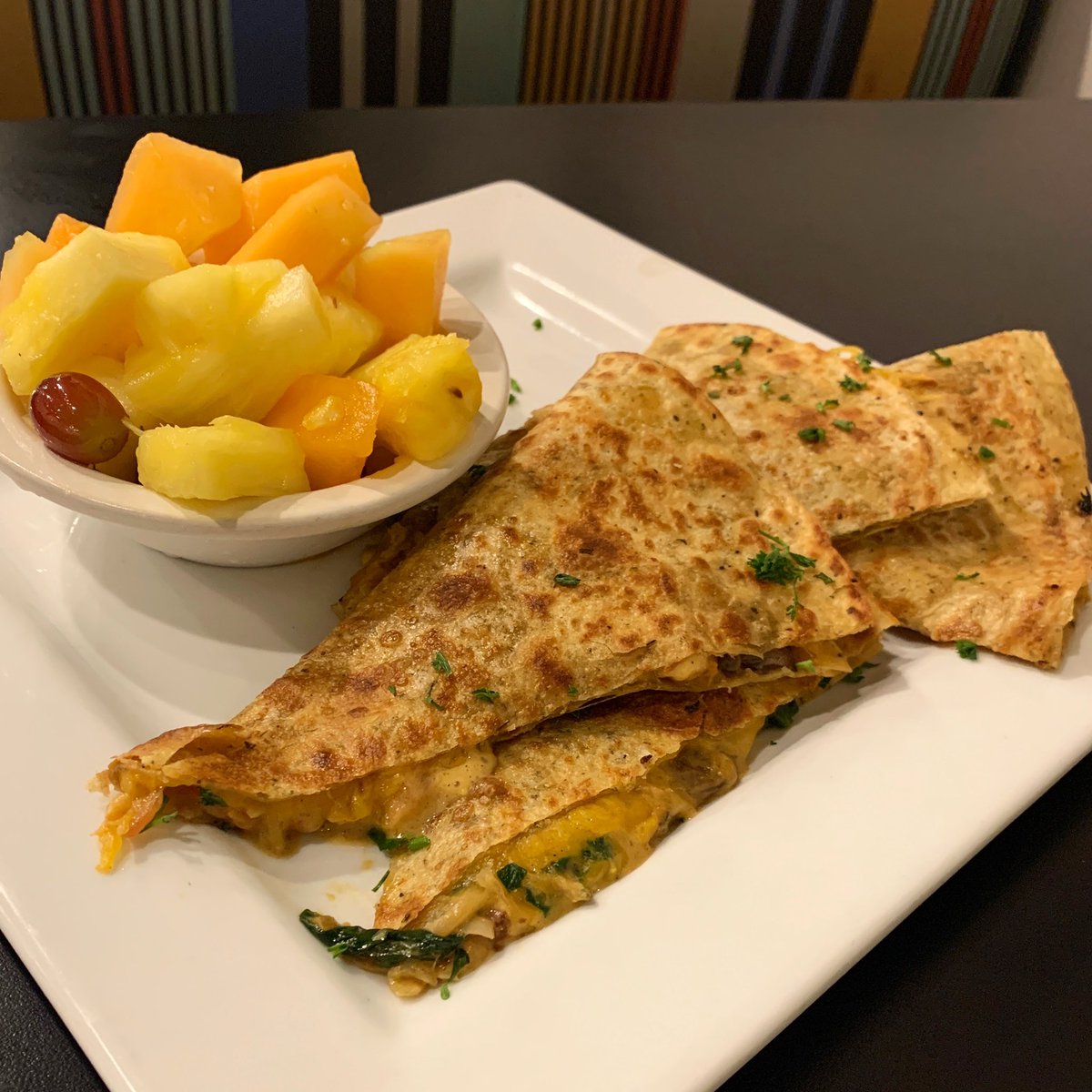 VEGGIE PIMENTO CHEESE QUESADILLA — Pimento cheese quesadilla loaded with spinach, peppers, onions and peppers with a side of guacamole ranch $10 with side