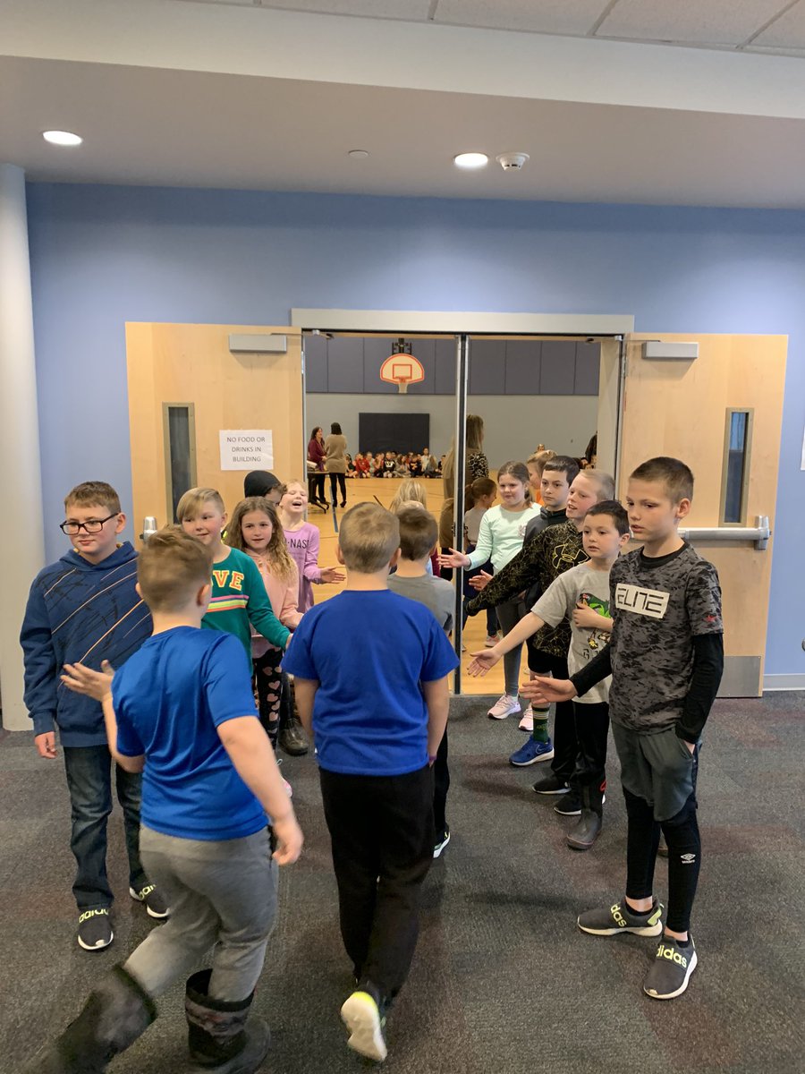 RocketReaders's tweet photo. @LibertyRockets Ss in charge of the school assembly!  Greeting kids at the door with positive messages #learnbps #PBL #authenticaudience https://t.co/Y0sq3N3gj8