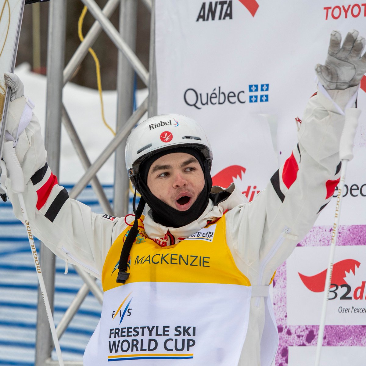 Mikael Kingsbury celebrates a win on the podium 