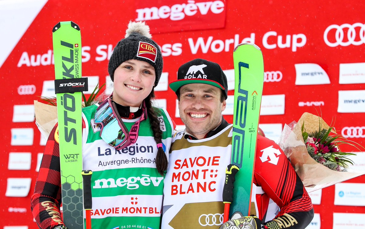 Marielle Thompson and Kevin Drury pose on the podium after both won their respective final