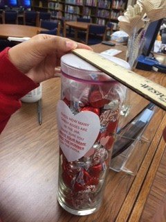 Students are using math in the library to guess how many candy kisses in the jar! #GISDlibraries <a href="/CCBMS_Braves/">Brandenburg MS</a>
