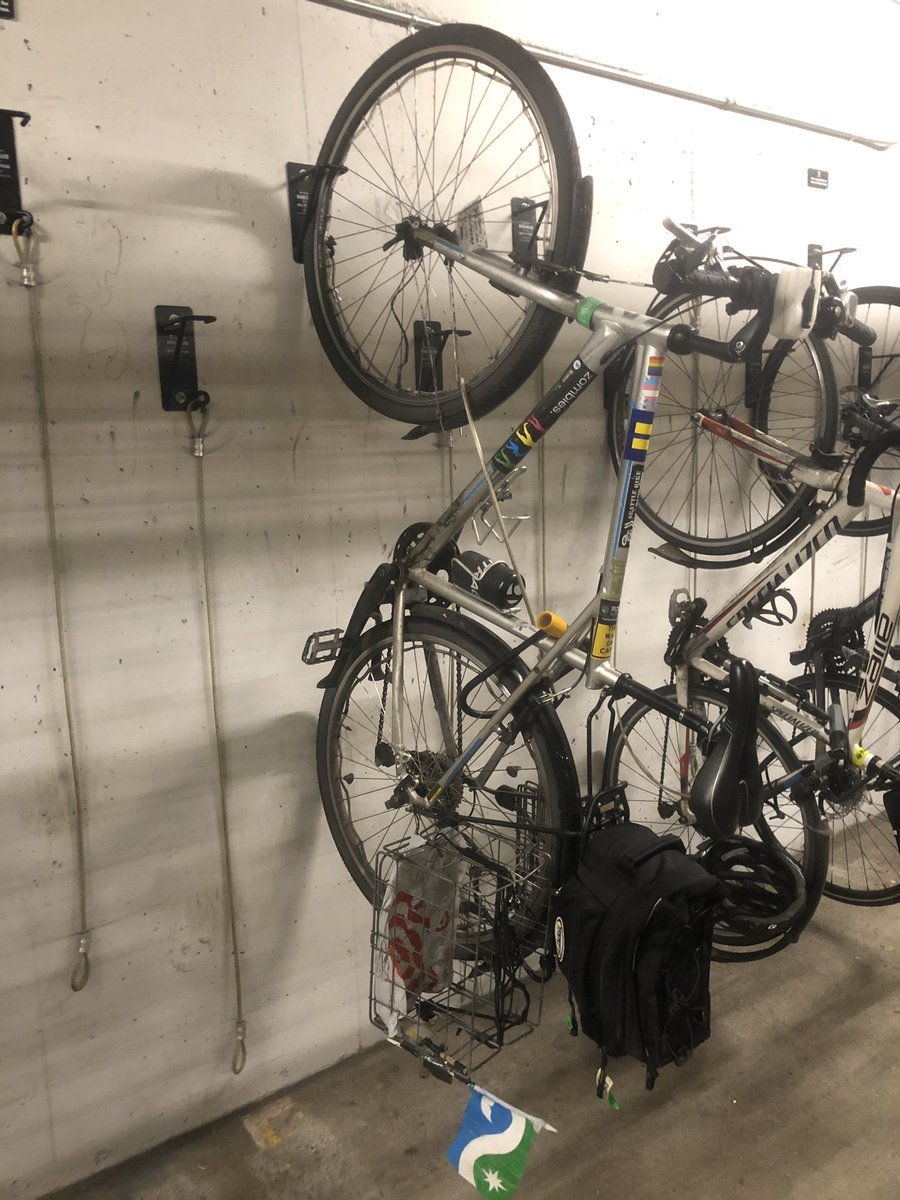 My bike hanging up in office bike cage
