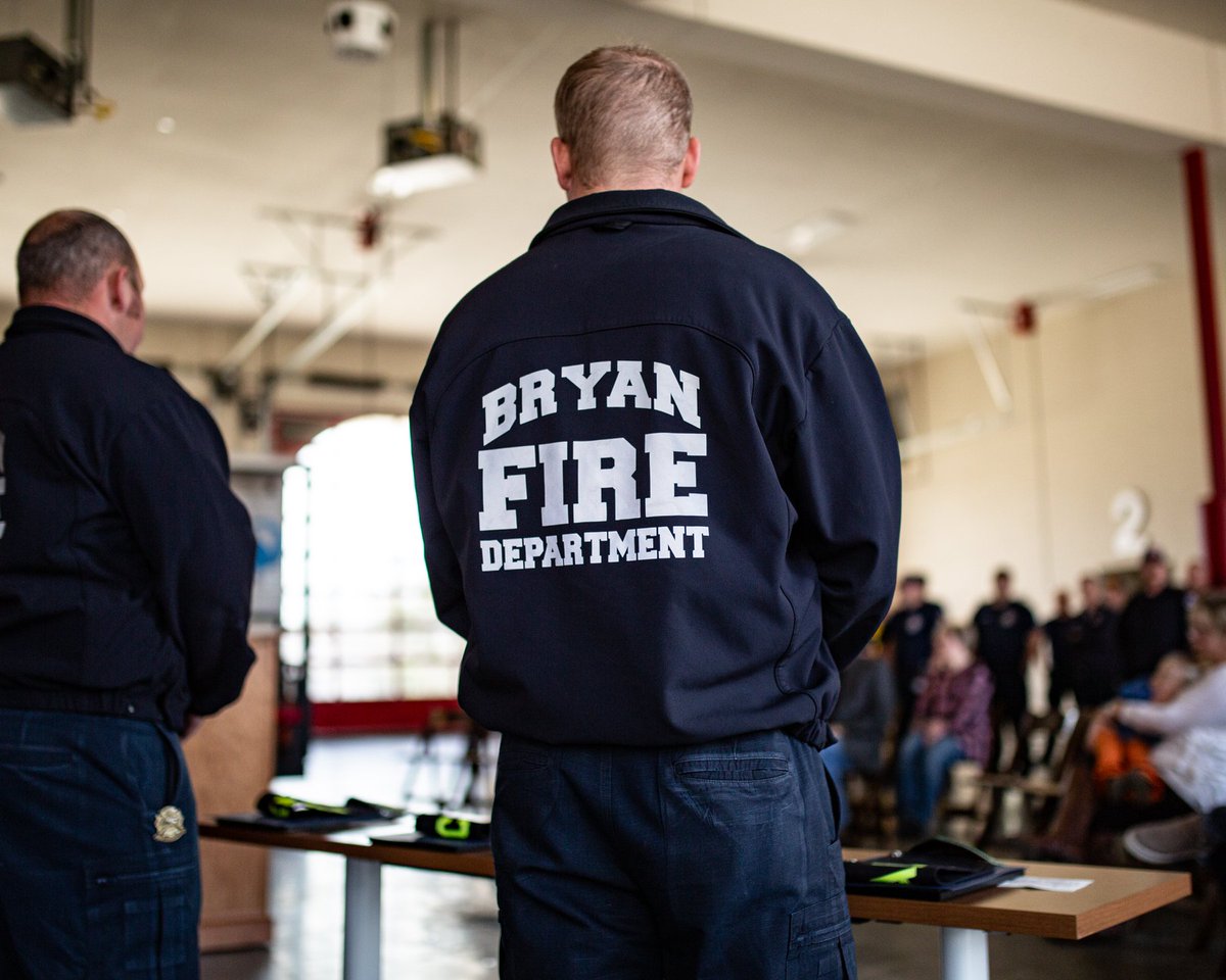 Back of a man's jacket that says Bryan Fire Department