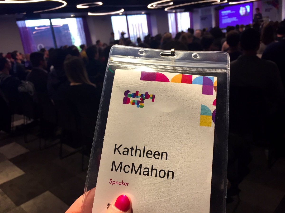 Holding my Gatsby Days LA speaker badge, observing a full house of attendees