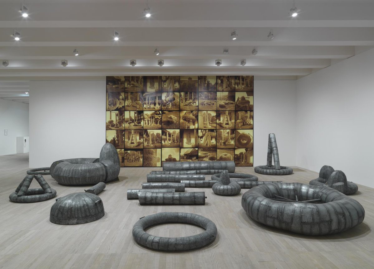 A large-scale installation called The Solemn Process comprising 21 unique metal sculptures of varying dimensions and forms