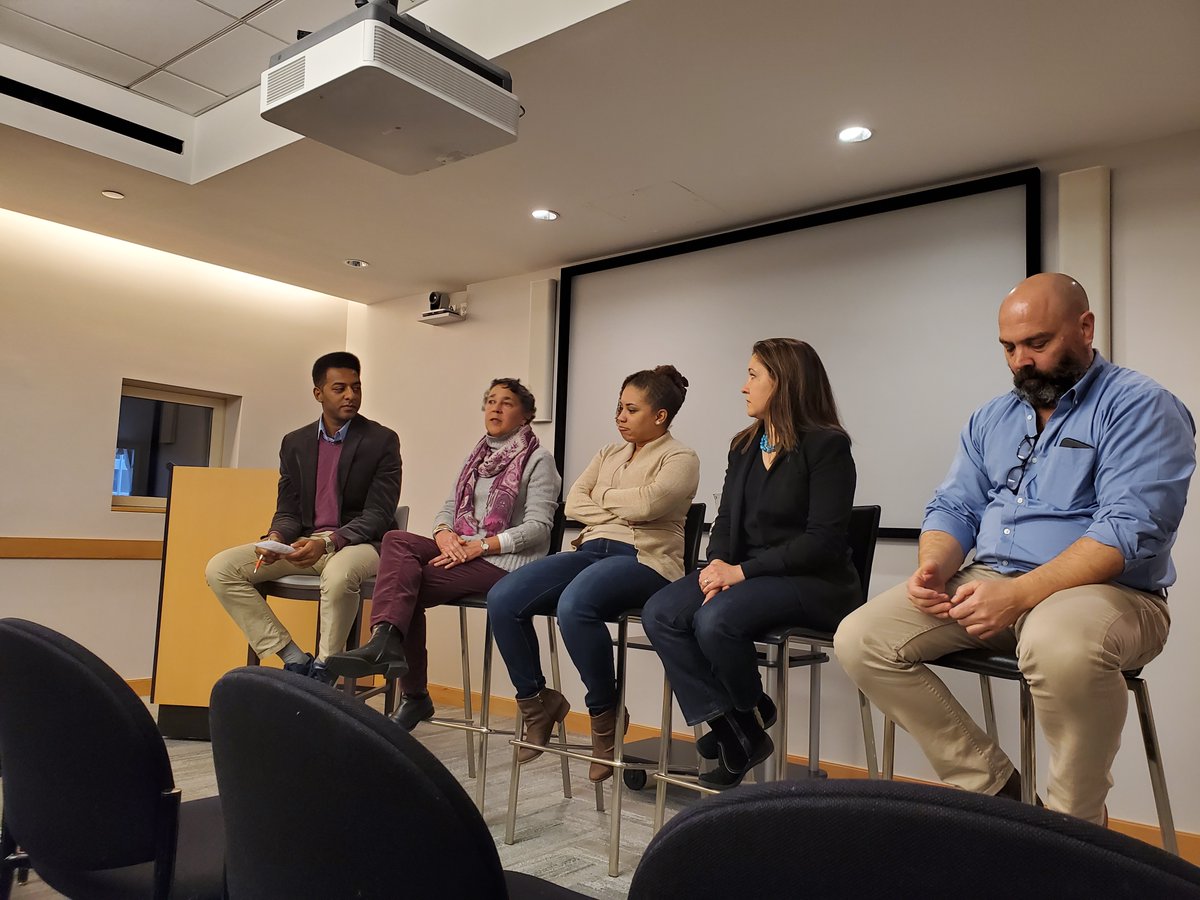Five people on a panel