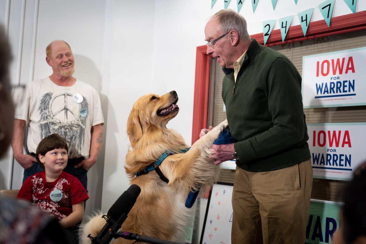 Elizabeth Warren's husband, Bruce, and their dog, Bailey.