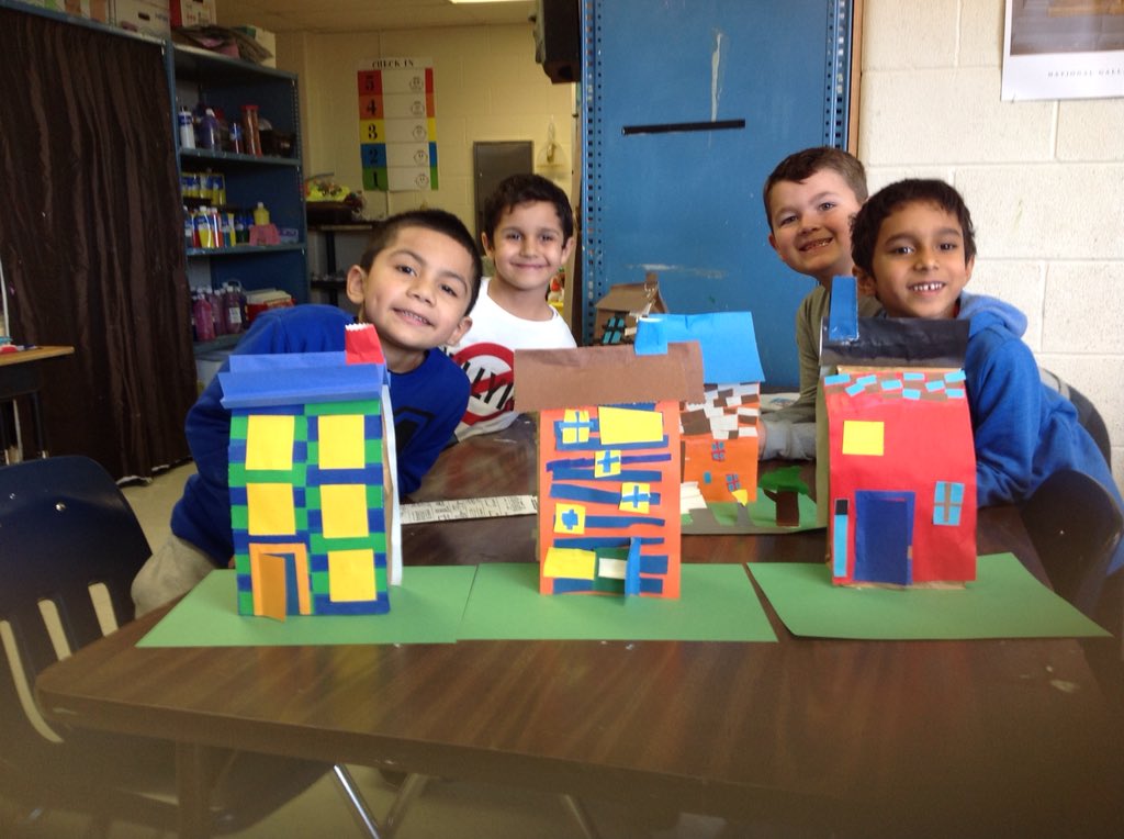 This table of first graders put their paper bag house sculptures together to make a neighborhood. <a href="/CubRunBarnes/">Claire Barnes</a>