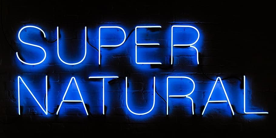 neon sign that reads SUPER NATURAL