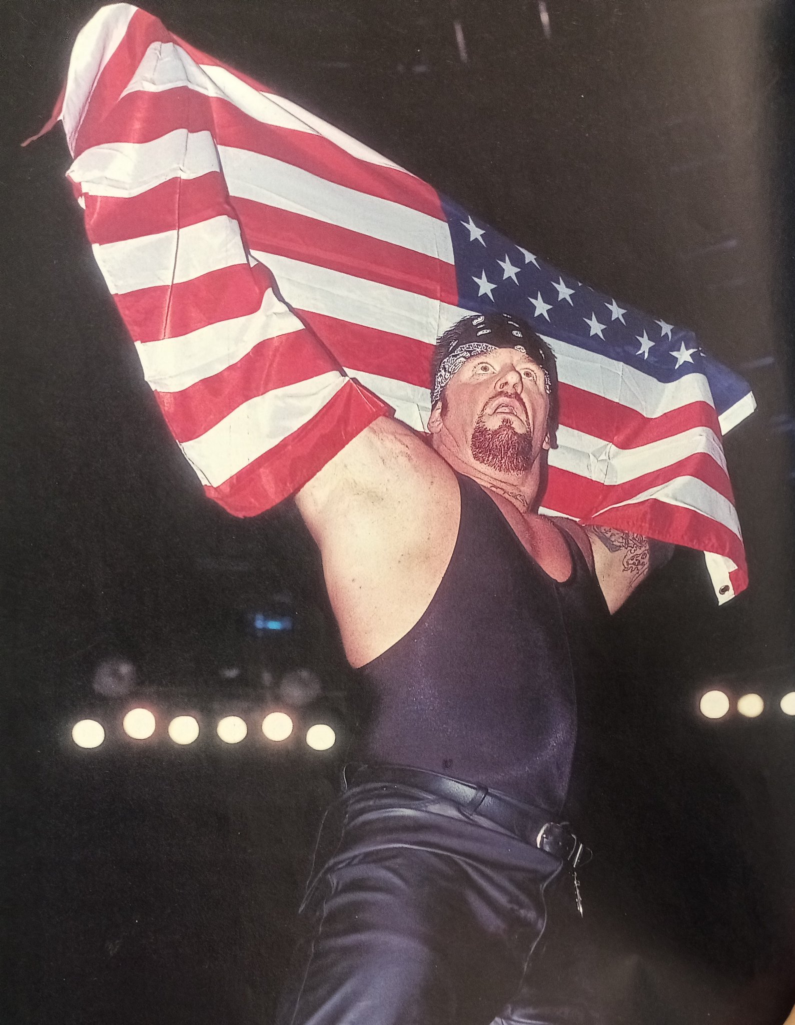 Rasslin' History 101 on Twitter: "The "All-American Badass":The Undertaker raising the American flag after defeating Test at SummerSlam 2002 https://t.co/RIsW6txfkT" / Twitter