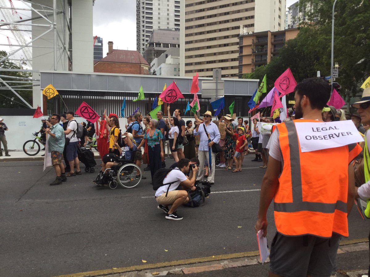 A crowd marching between parliament and the government offices.