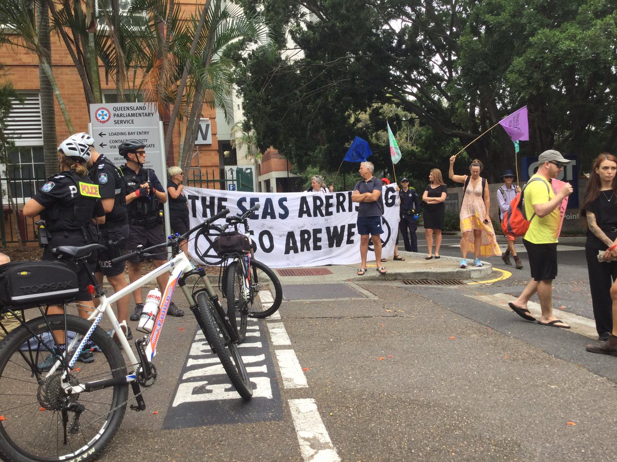 A banner with "the seas are rising, so are we".