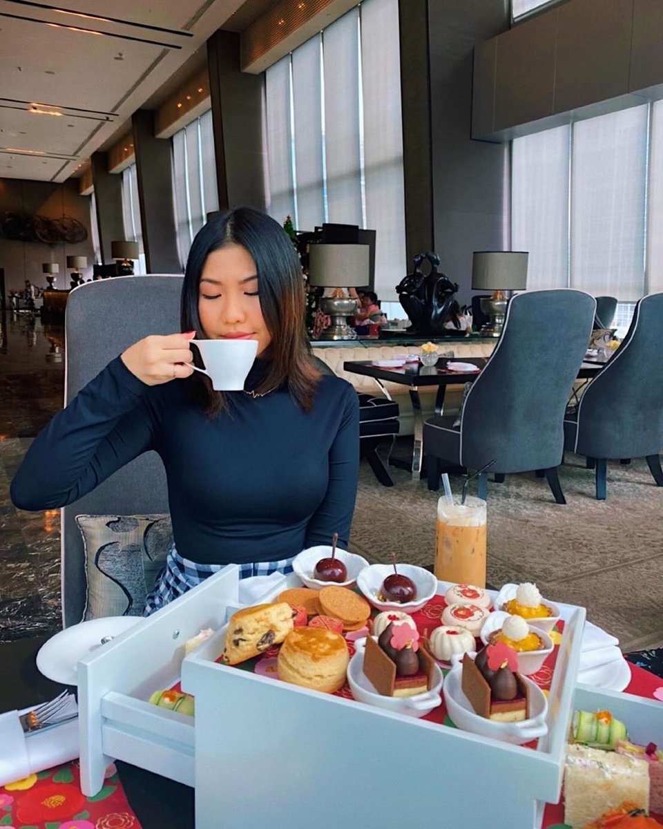 OkuraBangkok's tweet photo. Our thanks to @itsabelles for this picture of herself enjoying the sweet and savoury delights of our Tsubaki Afternoon Tea set
#theokuraprestigebangkok #okurabangkok #japaneseinfluence #upandabovebar
#tsubaki #afternoontea https://t.co/fTDW97rZEw