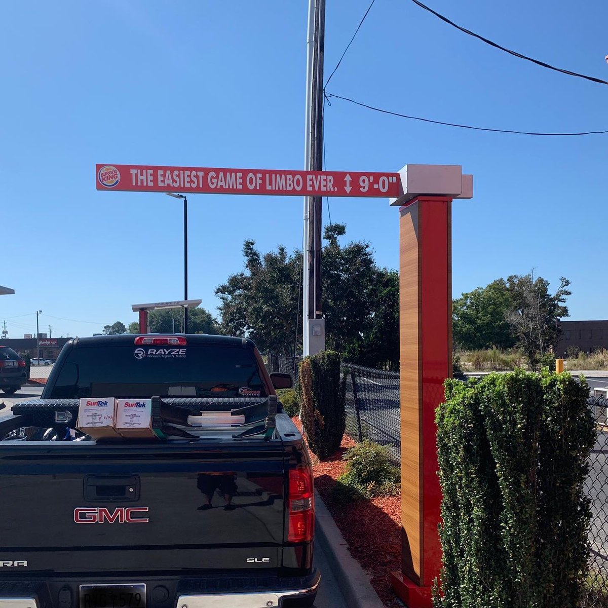 rayzesst's tweet photo. Another Clearance “Limbo” bar wrap we did for Burger King. #rayzesst https://t.co/jYj77DPOa4