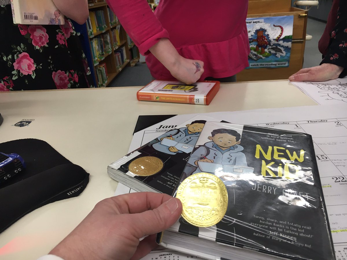 I waited all week for these books to be returned so I could crown NEW KID with the golden sticker.  Notice impatient kids waiting for their turn.  Congratulations to <a href="/JerryCraft/">Jerry Craft</a>   - we adore this book.