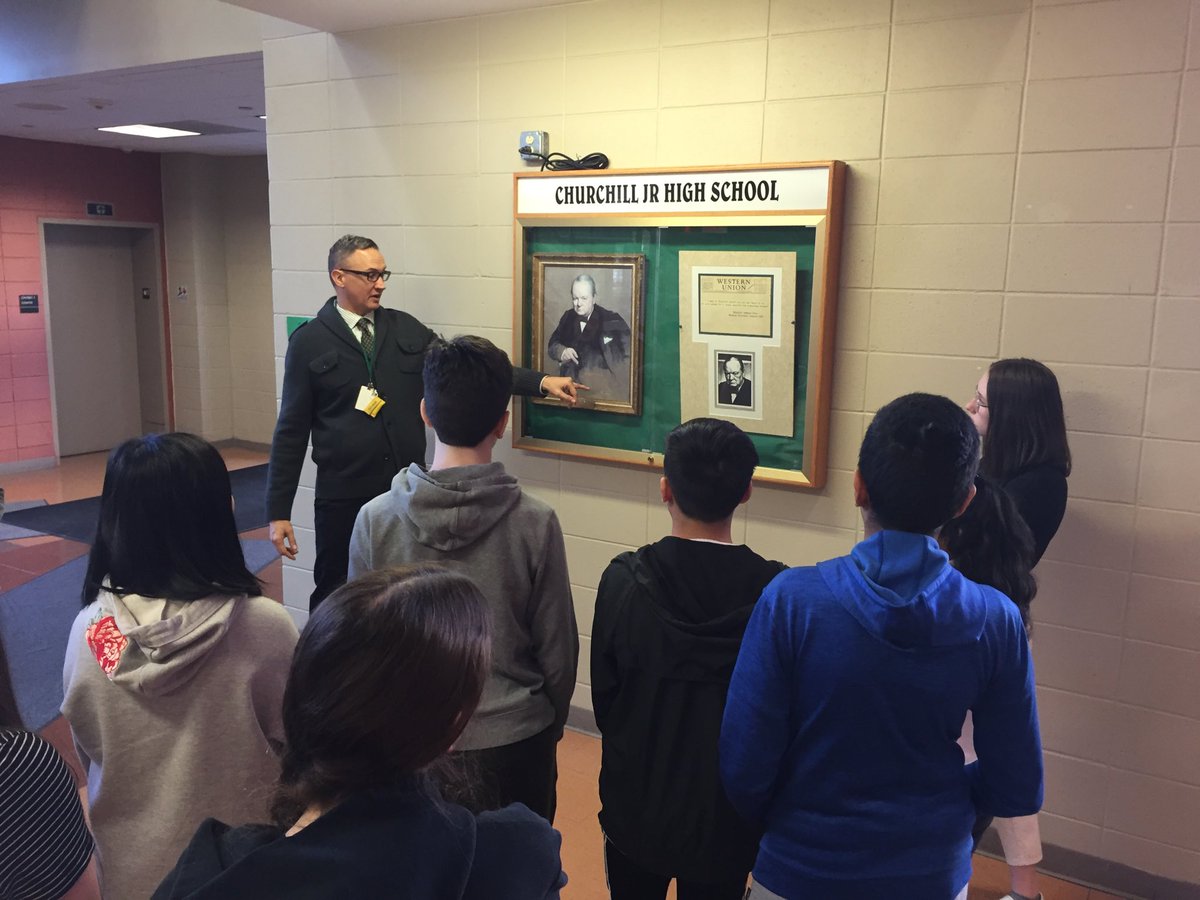 Thusar75's tweet image. Preparing his students for starting Hero of the Empire by  ⁦@candice_millard,⁩ Mr. Pawlowski leads his ⁦@EBCJHS⁩ students on an in school field trip to the main office so that they can read why we are Churchill Junior High. A simple but great idea.