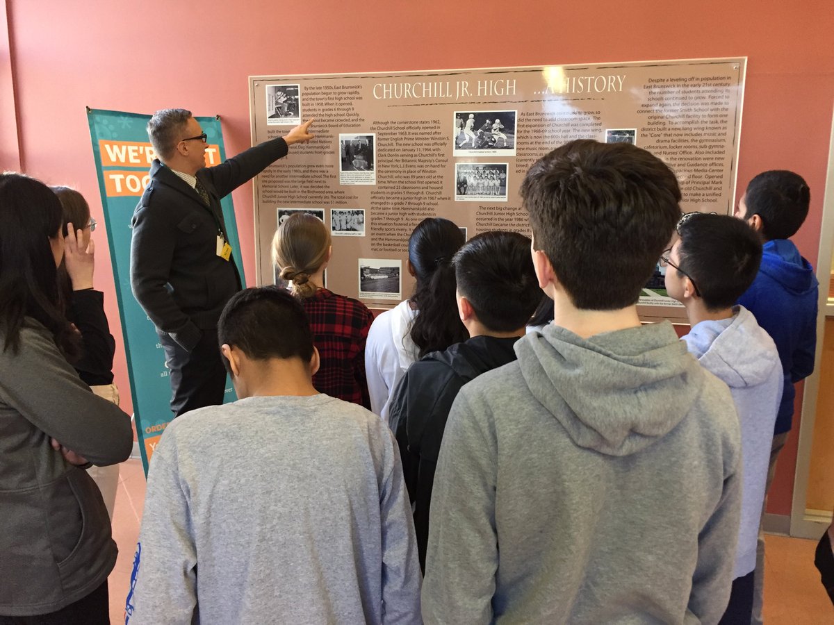 Thusar75's tweet image. Preparing his students for starting Hero of the Empire by  ⁦@candice_millard,⁩ Mr. Pawlowski leads his ⁦@EBCJHS⁩ students on an in school field trip to the main office so that they can read why we are Churchill Junior High. A simple but great idea.