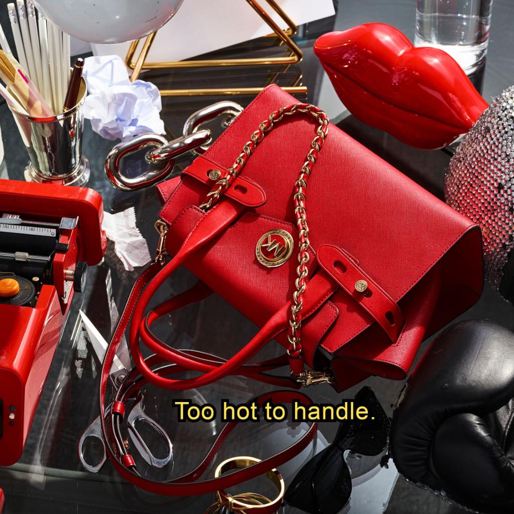Show them who’s boss with the red-hot Carmen satchel. #MichaelKors