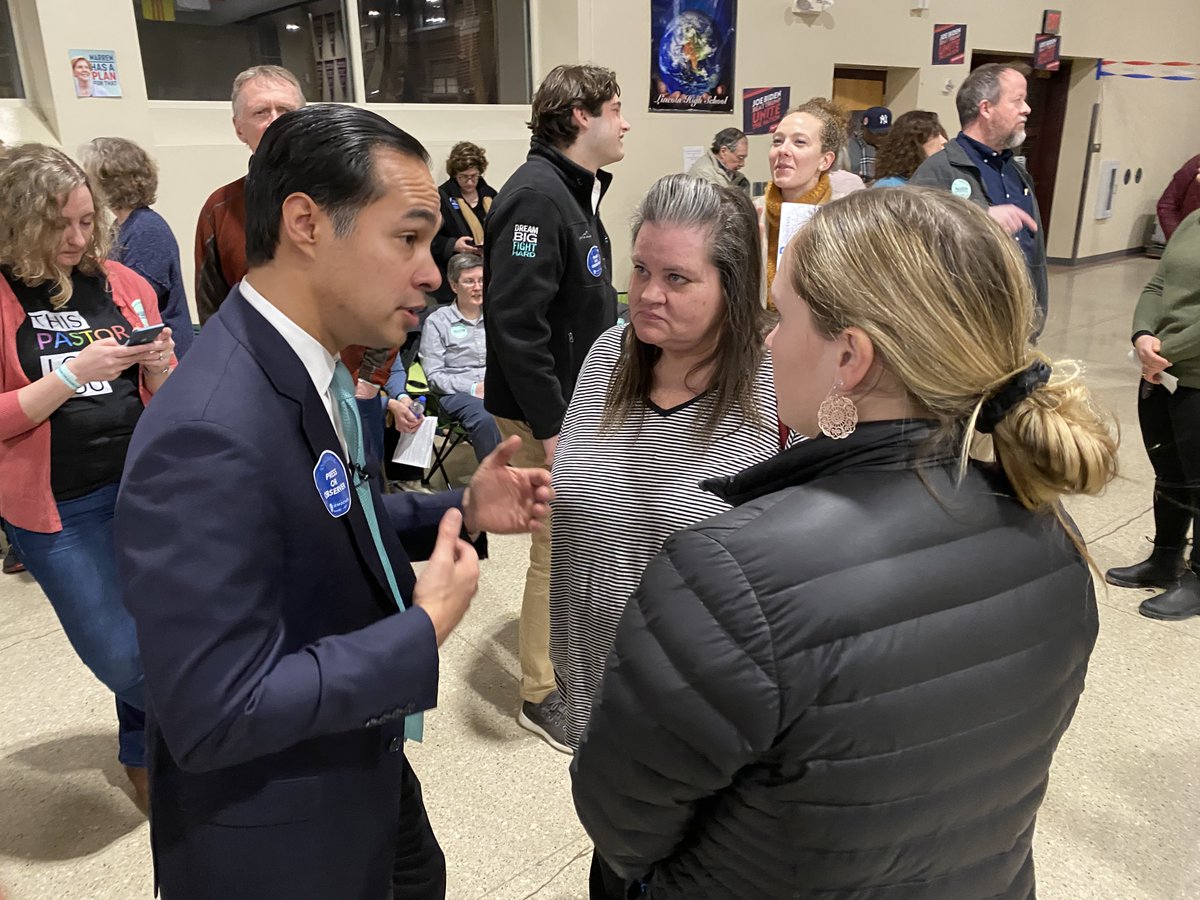 Julián Castro talks to caucusgoers in Iowa.