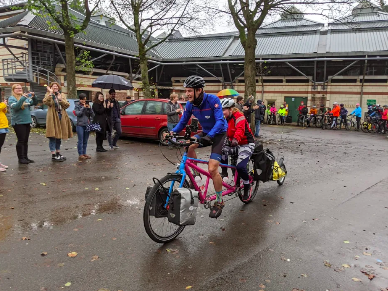 Luke starts his epic cycling expedition, from Bristol to Beijing, with a fellow CanLiver on a tandem. They're still smiling despite the rain! 