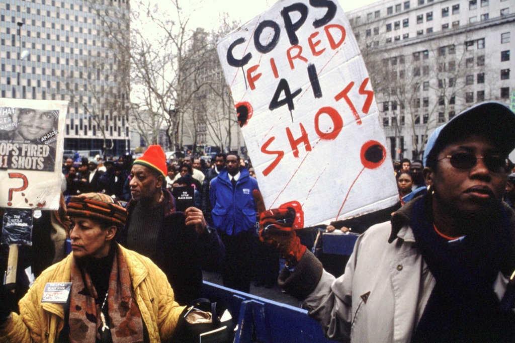 BlkHistStudies's tweet photo. Amadou Diallo’s death sparked protests around New York City against policy brutality. Credit...Andrew Holbrooke/The LIFE Images Collection, via Getty Images #ripamadoudiallo #amadoudiallo #policebrutality #protestsong #tribute https://t.co/s5hiSLisqX