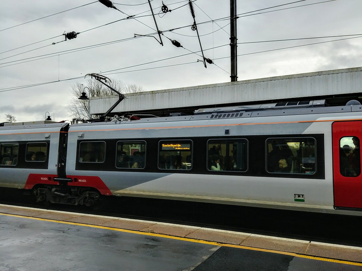 FLIRTing with the OHL. Southbound Greater Anglia Norwich-Stansted service raises pantograph at Ely.