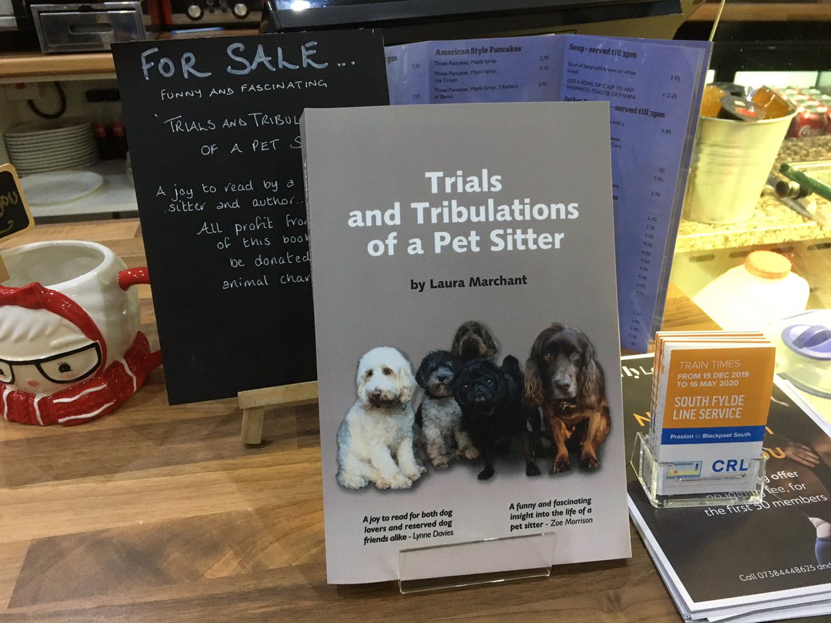 Photo of a dog book for sale on the counter ‘Trials and Tribulations of a Pet Sitter’