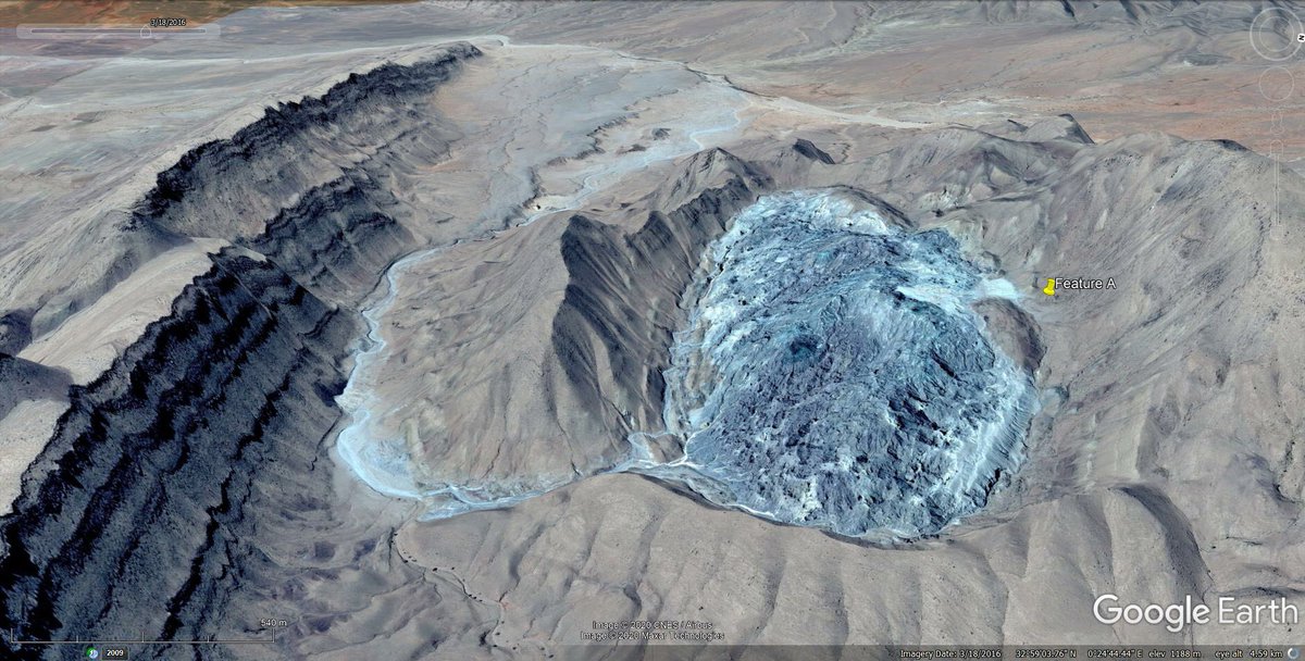 That first image is false colour (unusual on google earth), here’s a different image of the feature.It’s located here: https://goo.gl/maps/1CzXeauo2he5e25z7