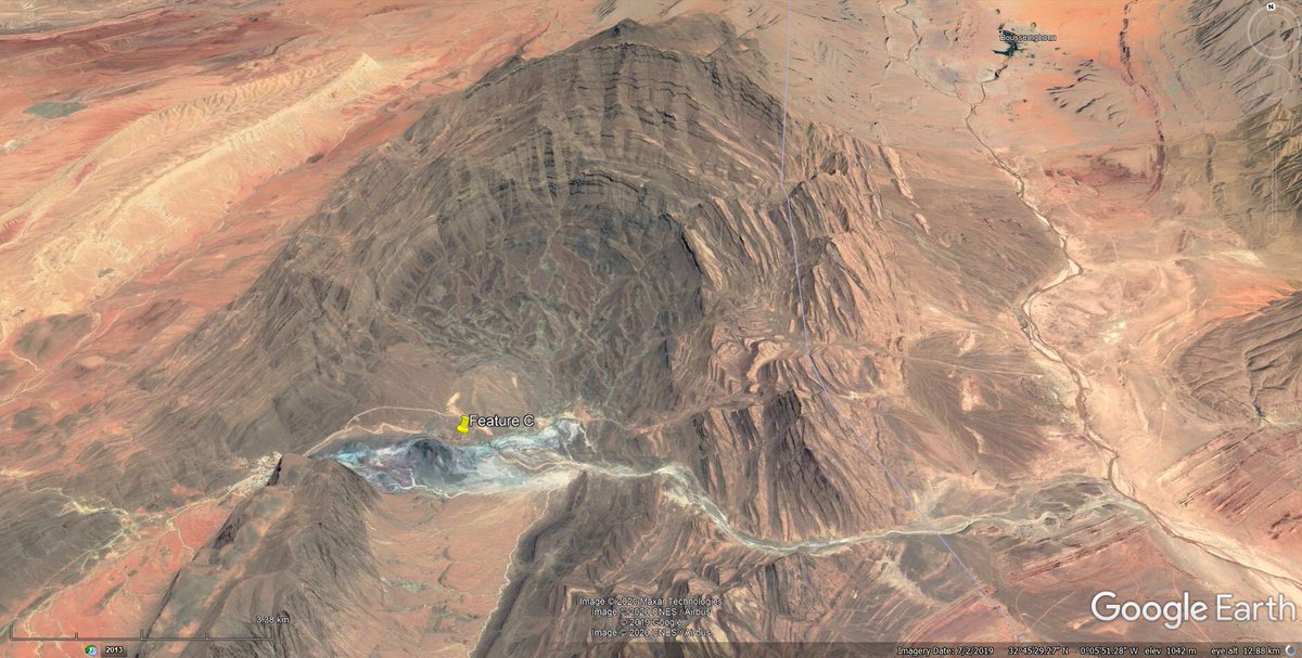 Here’s another, to the SW. They all have positive relief, similar smooth texture, and a distinctive greyish/blueish/greenish colour. And they sit in some pretty stunning geology.