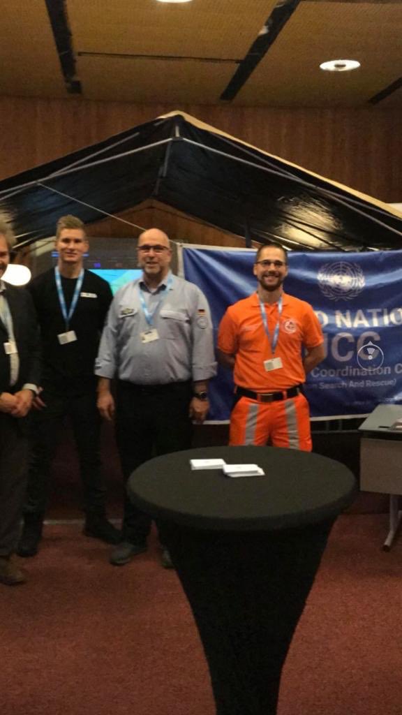 RescExpert's tweet photo. Our representative at the ⁦@LEP_HNPW⁩ at the #ucc stand of ⁦@Insarag⁩. Happy coordination. 😀 https://t.co/kKVVRn81zL