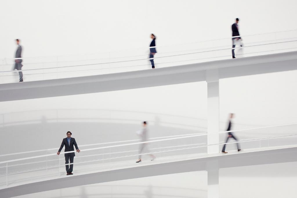 People walking up and down a ramp